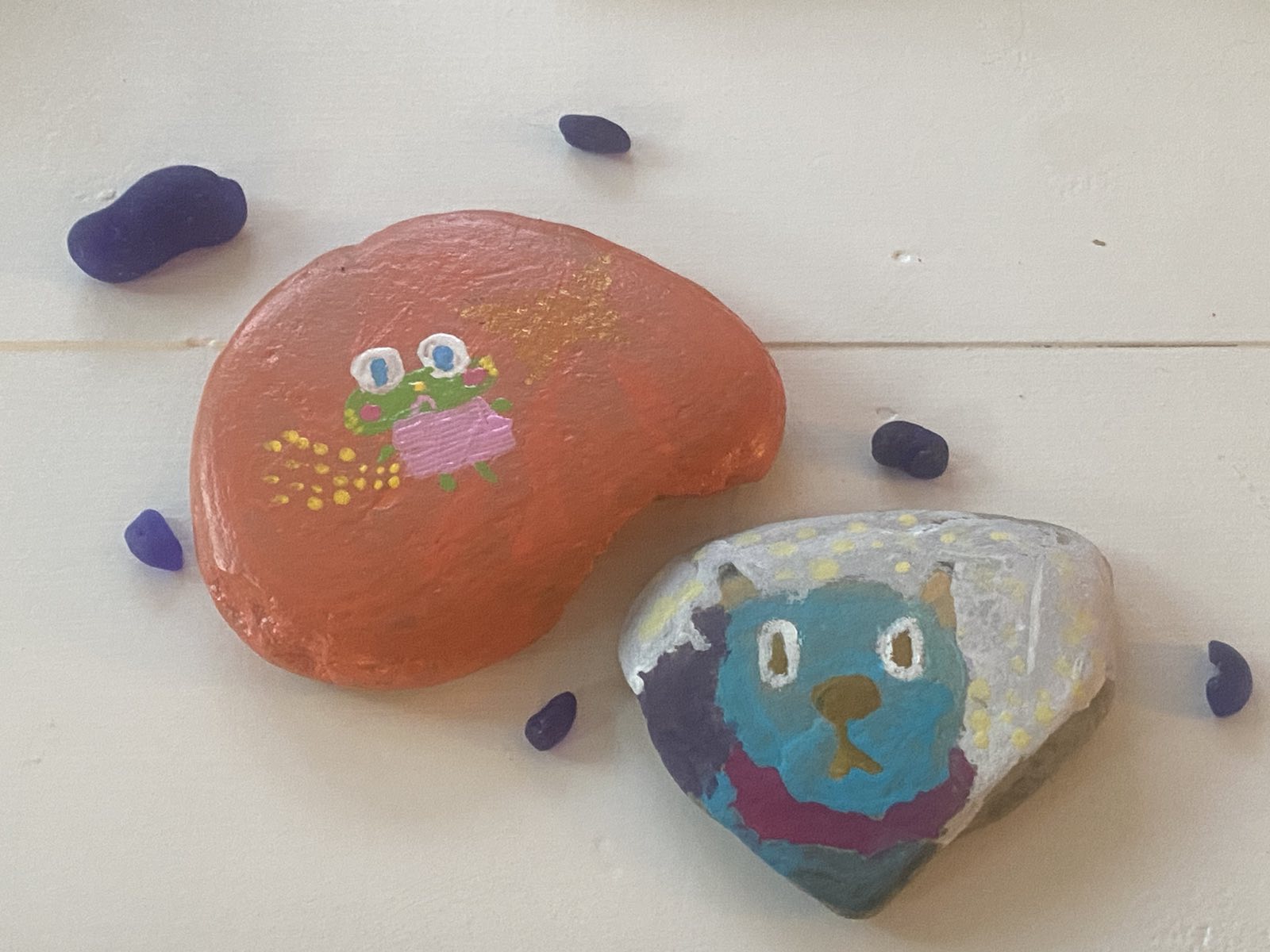 two painted rocks